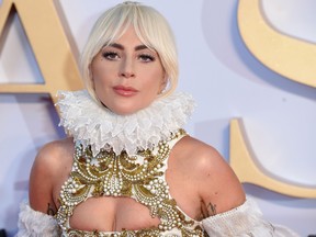 Lady Gaga poses on the red carpet upon arrival for the UK premiere of the film "A Star is Born" in central London on Sept. 27, 2018. (Anthony HARVEY/AFP)