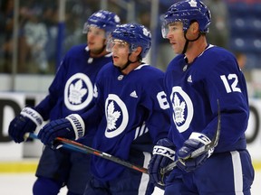 Tyler Ennis follows training-camp drills at the Gale Centre in Niagara Falls, flanked by linemates Patrick Marleau (right) and Auston Matthews. Ennis will remain on the line as long as William Nylander is holding out.  Dave Abel/Toronto Sun