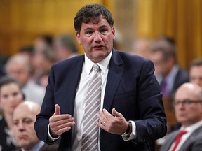 Minister of Fisheries, Oceans and the Canadian Coast Guard Dominic LeBlanc rises in the House of Commons during Question Period in Ottawa on June 11, 2018. (THE CANADIAN PRESS/ Patrick Doyle)