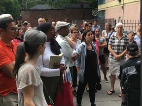 A group of residents walked through Dundas-Sherbourne Sts. area which has been plagued by drug addicts. (SUE-ANN LEVY PHOTO)