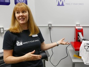 Christy Harper, Pickering Public Library's manager of technology, shows off a heat press in the library's Maker Space on Thursday, Sept. 13, 2018. (Chris Doucette/Toronto Sun/Postmedia Network)