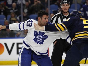 Buffalo Sabres Rasmus Ristolainen (55) and Toronto Maple Leafs Nazem Kadri (43) fight during the second period of an NHL hockey game, Monday, March. 5, 2018, in Buffalo, N.Y. (AP Photo/Jeffrey T. Barnes)