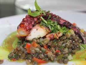 Grilled octopus with lentils in a curry butter highlights the menu at Le Blumenthal. (Nicole Hann photos)