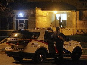 A boy, believed to be 16, was shot to death outside a highrise on Bellamy Rd. near Eglinton Ave. E., in Scarborough, on Friday, Sept. 14, 2018. (Chris Doucette)