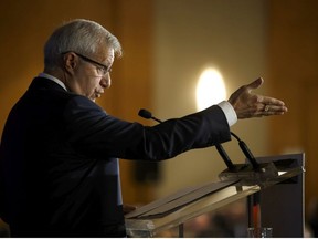Ontario finance minister Vic Fedeli speaks during an Economic Club of Canada event in Toronto on Friday, Sept. 21, 2018.