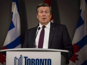 Toronto Mayor John Tory speaks to the media at City Hall on Friday, July 27, 2018. THE CANADIAN PRESS/Christopher Katsarov