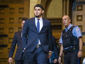 Former Blue Jays pitcher Roberto Osuna leaves the courthouse at Old City Hall in Toronto, Ont. on Tuesday (Ernest Doroszuk/Toronto Sun)