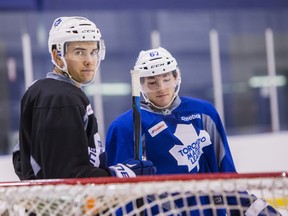 Former Maple Leafs prospect Stuart Percy (left) is trying to land a spot on the Ottawa Senators. (TORONTO SUN FILE)