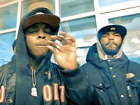 Alleged Crips street gang member Jerome Pantlitz-Solomon (left), 20, of Mississauga -- seen here in an online rap video -- was arrested on gun and drug charges in Wasaga Beach on Sept. 12, 2018. (YouTube)