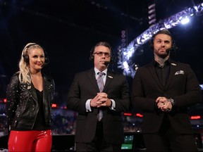 Renee Young joins fellow broacasters Michael Cole and Corey Graves at the commentary table during a recent episode of WWE Monday Night Raw. WWE)