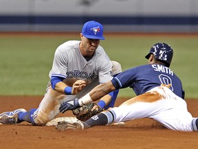 Toronto Blue Jays second baseman Jon Berti tags out Tampa Bay Rays' Mallex Smith at second base Saturday, Sept. 29, 2018, in St. Petersburg, Fla. (AP Photo/Steve Nesius)