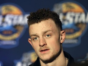 In this Jan. 27, 2018, file photo, Buffalo Sabres' Jack Eichel answers a question during media day for the 2018 NHL All Star hockey game in Tampa, Fla.