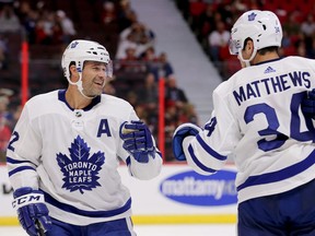 Patrick Marleau congratulates Auston Matthews on his goal in period two as the Ottawa Senators face the Toronto Maple Leafs at the Canadian Tire Centre in pre-season NHL action Sept. 19, 2018. Wayne Cuddington/ Postmedia