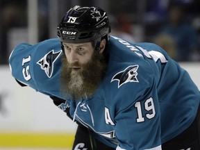 In this Jan. 23, 2018, file photo, San Jose Sharks' Joe Thornton (19) looks on during the second period of an NHL hockey game against the Winnipeg Jets in San Jose, Calif.
