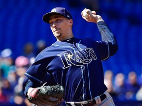 Tampa Bay Rays starting pitcher Blake Snell works against the Toronto Blue Jays during third inning American League baseball action in Toronto, Sunday, Sept. 23, 2018.