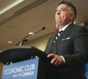 Finance Minister of Ontario, Charles Sousa announces the creation of a council to review Hydro One, OPG, and the LCBO during a luncheon for the Economic Club of Canada in Toronto on Friday, April 11, 2014. (Veronica Henri/Toronto Sun)