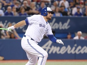 The Blue Jays' Rowdy  hits a double in the eighth inning against the Cleveland Indians at Rogers Centre on Friday night. (Getty Images)