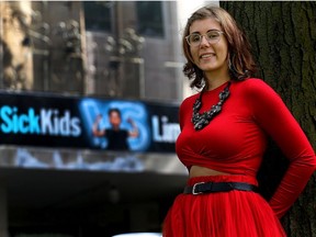 Tessa Smith, a cancer survivor who wrote a heartfelt letter to Terry Fox, on the front lawn of Sick Kids Hospital in Toronto on Wednesday September 26, 2018. She was there to determine if her cancer is back for the 3rd time. Dave Abel/Toronto Sun/Postmedia Network