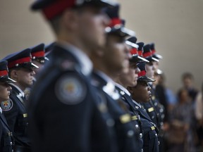 Toronto Police College Graduation Ceremony  at the campus on Birmingham Street in Toronto, Ont. on Thursday September 27, 2018. Toronto Police Service welcomes 27 new police officers. Ernest Doroszuk/Toronto Sun/Postmedia