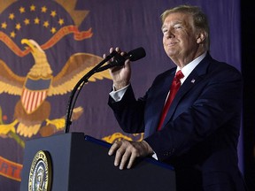 President Donald Trump speaks at a fundraiser in Fargo, N.D., Friday, Sept. 7, 2018. (AP Photo/Susan Walsh)