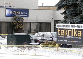 A bullet hole can be seen in the window as York Region Police investigate the fatal shooting of Mila Barberi, 28, of Woodbridge, on Caster Ave. on March 14, 2017. Michael Peake/Toronto Sun