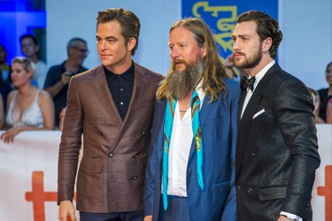 Actor Chris Pine (from left), director David Mackenzie, and actor Aaron Taylor-Johnson for the red carpet arrival for the movie -  Outlaw King  - during the Toronto International Film Festival at Roy Thomson Hall in Toronto, Ont. on Thursday September 6, 2018. Ernest Doroszuk/Toronto Sun/Postmedia