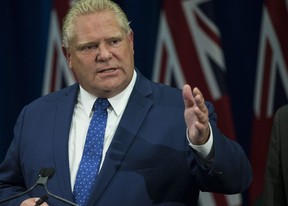 Premier Doug Ford holds a press conference arguing against the judges ruling about slashing the size of City council in Toronto, Ont. on Monday. (Craig Robertson/Toronto Sun)