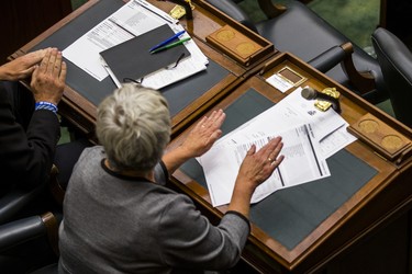 Ontario NDP MPPs pounding their desks in protest during the afternoon session in the legislature at Queen's Park in Toronto, Ont. on Wednesday September 12, 2018. Ernest Doroszuk/Toronto Sun/Postmedia