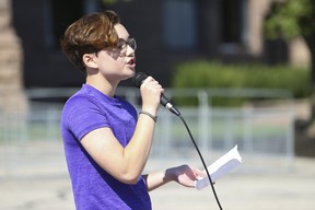 Noah, a transgender Grade 10 student from Northern secondary, speaks to the crowd. (Jack Boland/Toronto Sun)