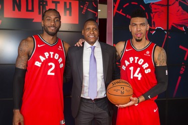 New on the Raptors roster Kawhi Leonard (left) and Danny Green (right) are joined by Toronto Raptors president Masai Ujiri following a press conference at the Toronto Raptors media day at the Scotiabank Arena in Toronto, Ont. on Monday September 24, 2018. Ernest Doroszuk/Toronto Sun/Postmedia