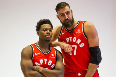 Toronto Raptors Kyle Lowry (left) and Jonas Valanciunas during team photos at the Toronto Raptors media day at the Scotiabank Arena in Toronto, Ont. on Monday September 24, 2018. Ernest Doroszuk/Toronto Sun/Postmedia