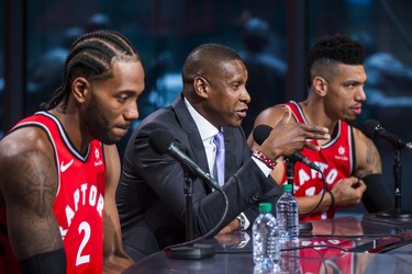 New on the Raptors roster Kawhi Leonard (left) and Danny Green (right) are joined by Toronto Raptors president Masai Ujiri during a press conference at the Toronto Raptors media day at the Scotiabank Arena in Toronto, Ont. on Monday September 24, 2018. Ernest Doroszuk/Toronto Sun/Postmedia