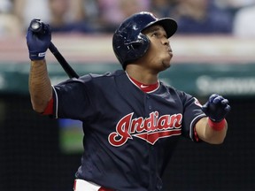 Cleveland Indians' Jose Ramirez is having a Mike Trout-like fantasy season, even moreso when you factor in his multi-position eligibility. (AP Photo/Tony Dejak)