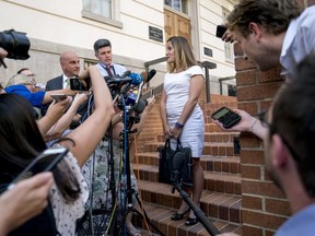 Canadian Foreign Affairs Minister Chrystia Freeland speaks to members of the media as she arrives at the Office Of The United States Trade Representative, Tuesday, Aug. 28, 2018, in Washington. Canada, America's longtime ally and No. 2 trading partner, was left out of a proposed deal Trump just reached with Mexico and is scrambling to keep its place in the regional free-trade bloc -- and fend off the threat of U.S. taxes on its vehicles.