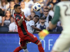 TFC defender Gregory van der Wiel (left) faces his old PSG teammate Zlatan Ibrahimovic tonight. (The Canadian Press)