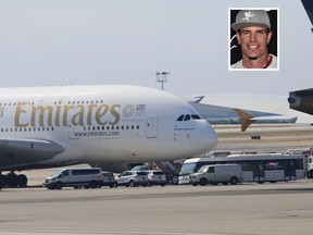 Emergency response crews gather outside a plane at JFK Airport amid reports of ill passengers aboard a flight from Dubai on Wednesday Sept. 5, 2018, in New York. Rapper Vanilla Ice, inset, was on board the plane, but was not among the passengers that fell ill. (AP Photo/Bebeto Matthews)