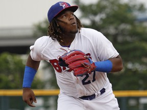 Buffalo Bisons' Vladimir Guerrero Jr. chases a foul ball hit by a Lehigh Valley IronPigs batter during the first inning of his triple-A debut with the affiliate of the Toronto Blue Jays on July 31, 2018, in Buffalo N.Y. (JEFFREY T. BARNES/AP files)