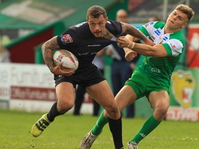 Greg Worthington (left) and the Toronto Wolfpack defeated the Widnes Vikings 20-12 on Saturday. (THE CANADIAN PRESS/FILE)