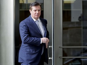 In this Feb. 14, 2018 file photo, Paul Manafort, U.S. President Donald Trump's former campaign chairman, leaves the federal courthouse in Washington.