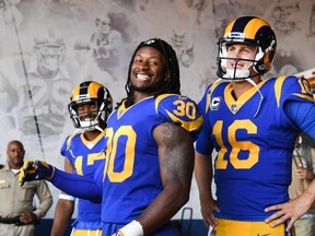 L.A. Rams' running back Todd Gurley (centre) and quarterback Jared Goff (right) have led the team's dominant offence. (GETTY IMAGES)