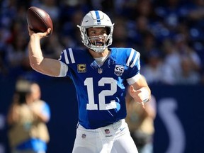 Andrew Luck #12 of the Indianapolis Colts throws a pass during the game against the Houston Texans at Lucas Oil Stadium on September 30, 2018 in Indianapolis, Indiana.