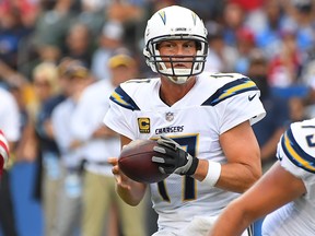 Quarterback Philip Rivers of the Los Angeles Chargers gets set to throw a touchdown pass to Chargers running back Austin Ekeler in the second quarter of the game at StubHub Center on September 30, 2018 in Carson, Calif.  (Jayne Kamin-Oncea/Getty Images)