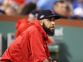 Starting pitcher David Price of the Boston Red Sox looks on from the dugout prior to the fifth inning of Game 2 of the American League Division Series against the New York Yankees  at Fenway Park on Oct. 6, 2018 in Boston.  (Elsa/Getty Images)