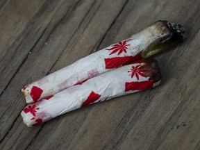Marijuana joints rolled with Canadian-themed paper are photographed at a "Wake and Bake" legalized marijuana event in Toronto on Oct. 17, 2018. (THE CANADIAN PRESS)