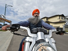 Bhupinder Singh rides a motorcycle without a helmet in Edmonton, Alberta on May 9, 2018. (Ed Kaiser/Postmedia)