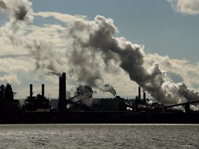 The steel mills in the Hamilton waterfront harbour are shown in Hamilton on Oct. 23, 2018. (The Canadian Press)