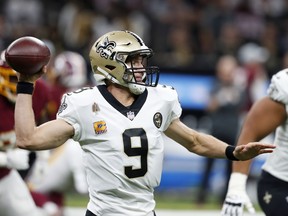 Drew Brees and the 
 New Orleans Saints visit Baltimore on Sunday. (AP PHOTO)
