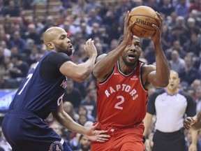 Raptors forward Kawhi Leonard goes up for a shot during Wednesday's win over Minnesota. (VERONICA HENRI/Toronto Sun)