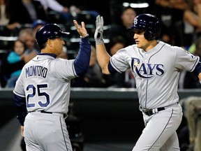 Charlie Montoyo congratulates Tampa Bay Rays' Mikie Mahtook after a home run during last season. (GETTY IMAGES)