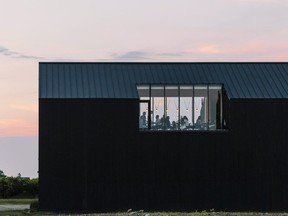 The exterior of Pearl Morissette at dusk is shown in Jordan Station, Ont., in this 2018 handout photo. Canada's best new restaurant sits on the second floor of a barn in Niagara wine country, according to Air Canada's enRoute magazine.  THE CANADIAN PRESS/HO - Alanna Hale